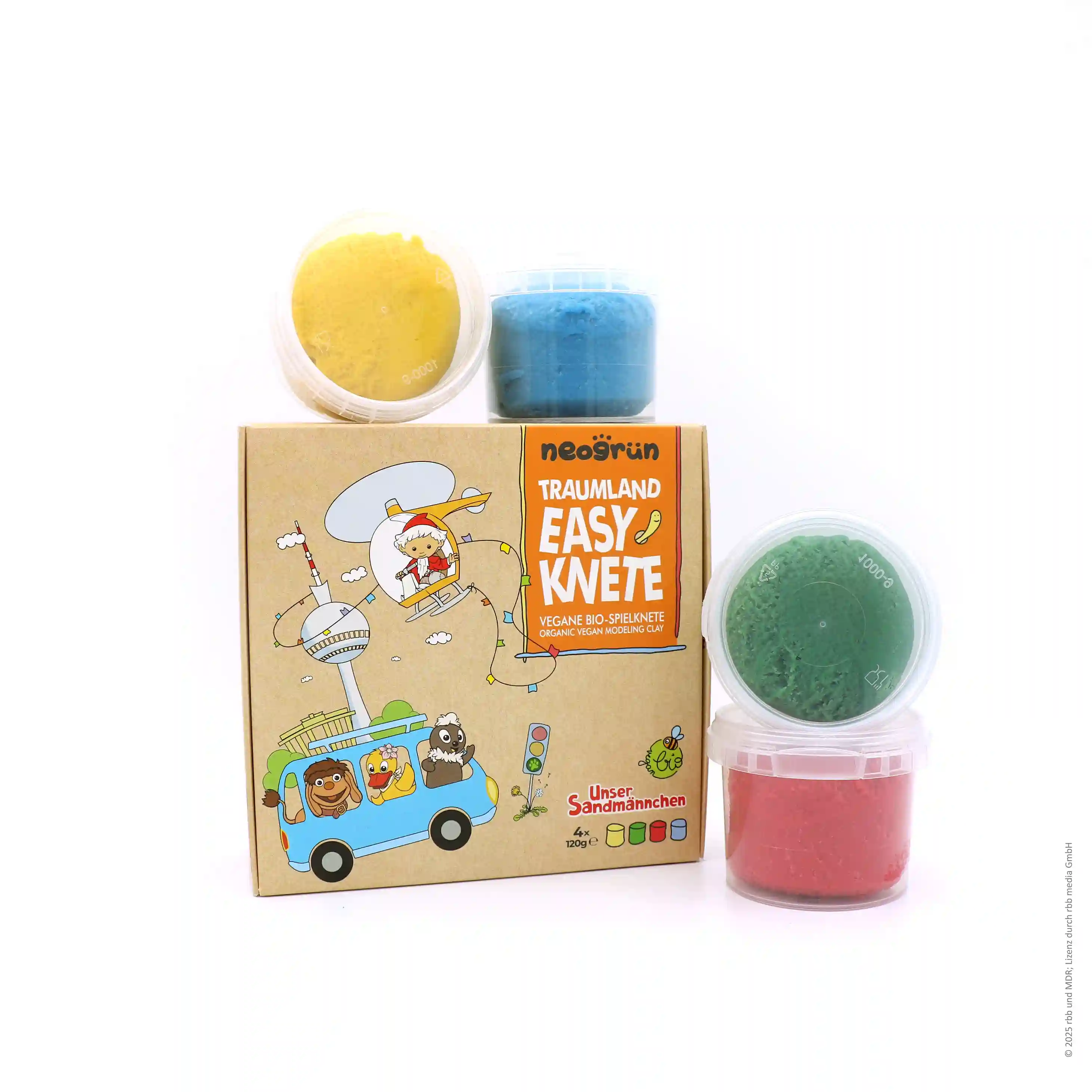 Sandmännchen Knete stehend, daneben Knete in geöffneter Verpackung